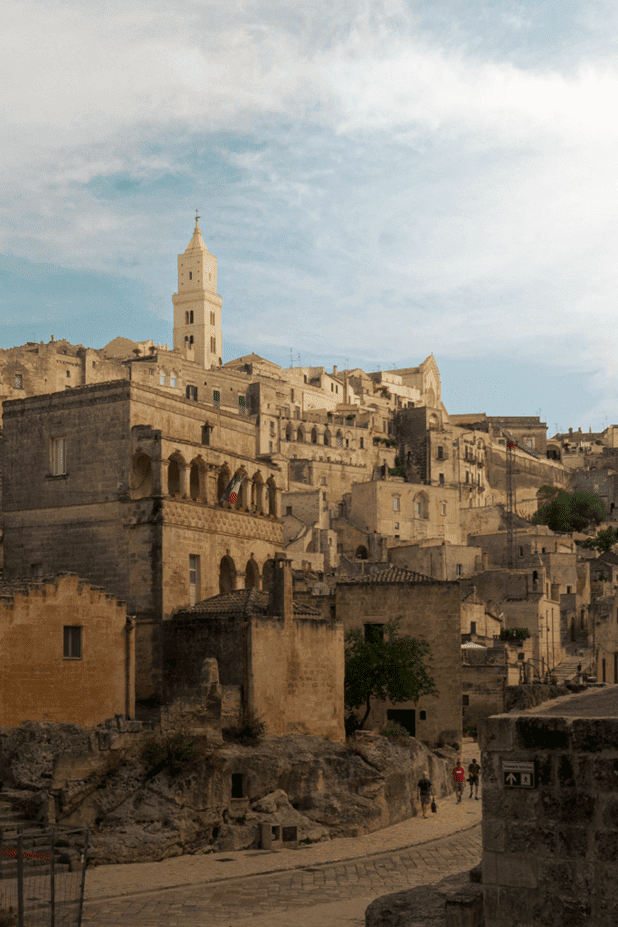 View of ancient hillside of buildings from Page 28's guide to Matera Italy