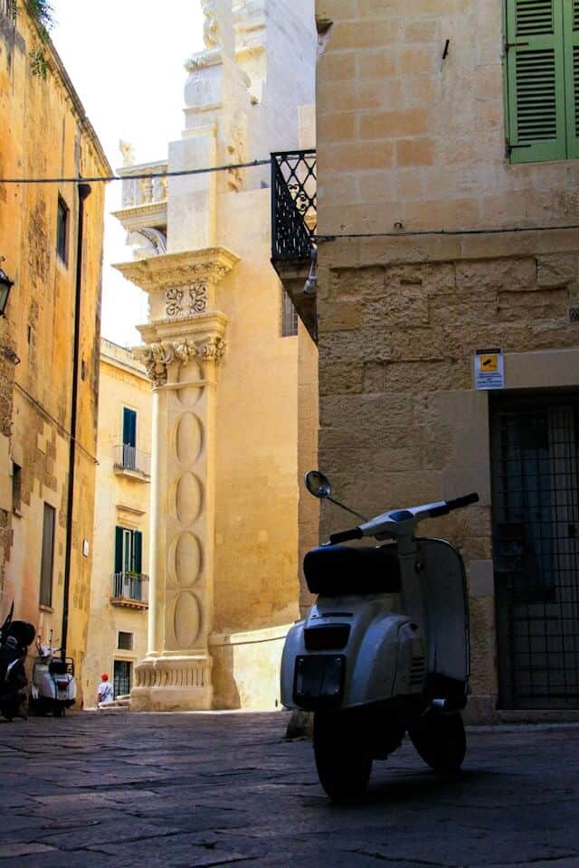 Italian Vespa on a side street in Lecce Italy.