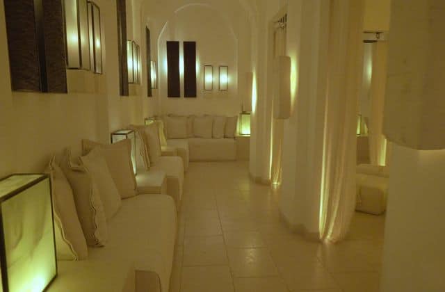 White latern-lit lobby of Borgo Egnazia.