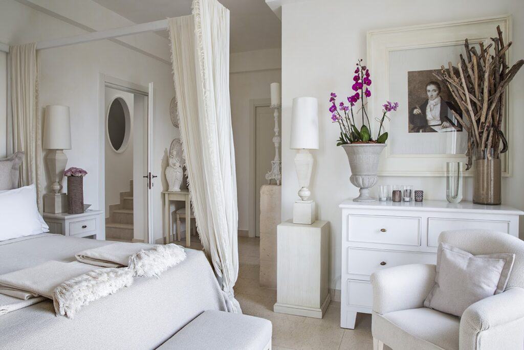 An all-whtie guest room at Borgo Egnazia.