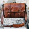 A vintage leather messenger bag